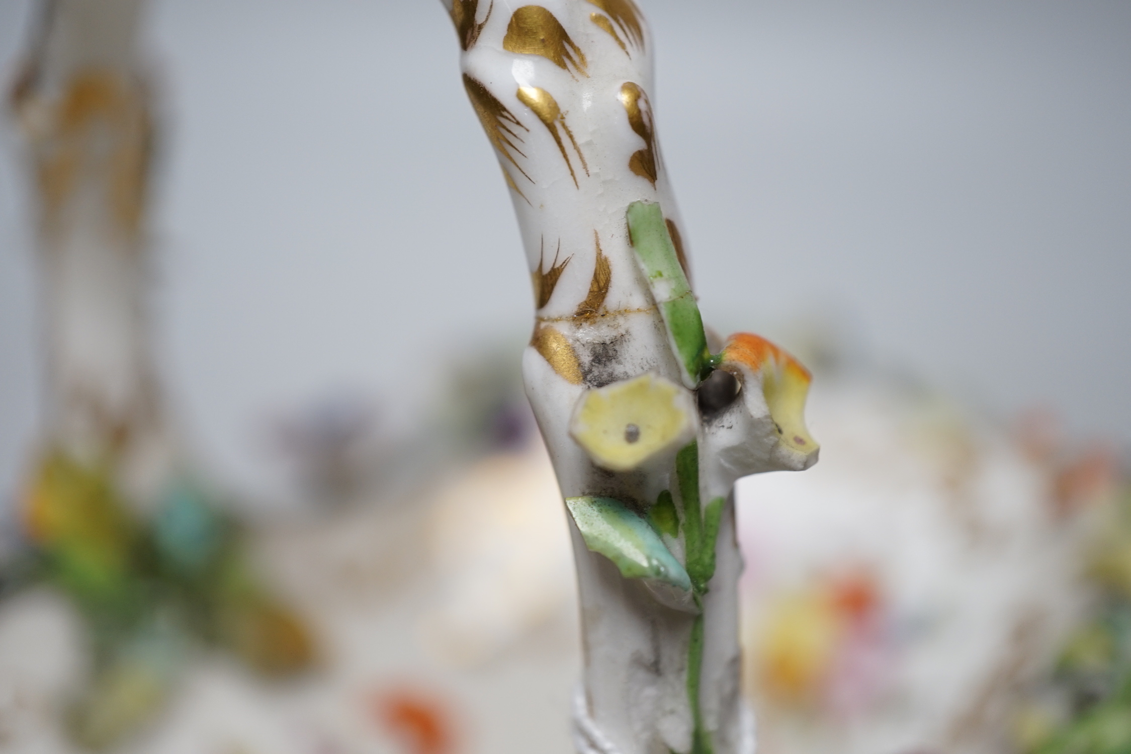 A Grainger Lee and co. miniature pot pourri vase with pierced cover, decorated with a view of Worcester Cathedral and the River Severn, on a blue ground, with two scroll handles and four paw feet and a Coalbrookdale flor